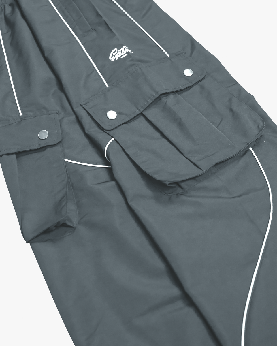 EPTM ALPHA CARGO BAGGY 3M PIPING SWEATPANTS